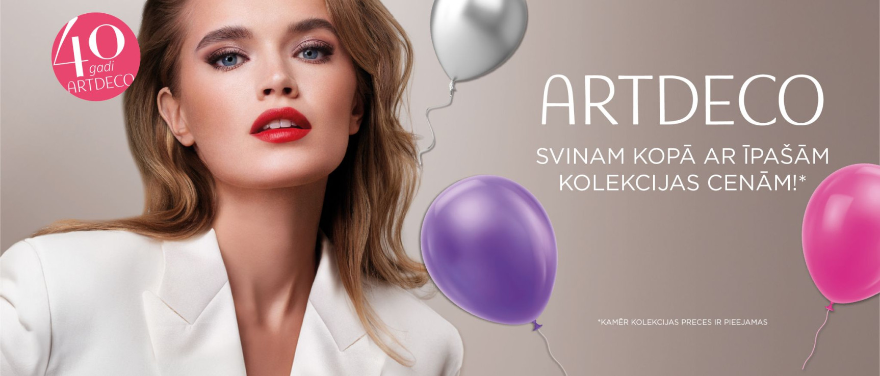 ARTDECO svin 40 gadu jubileju – Eleganta sieviete ar krāsainiem baloniem.
